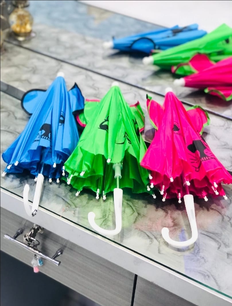 Kids cartoon umbrella with cute printed design – random design