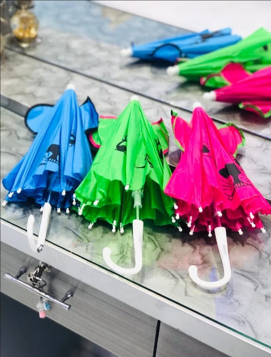 Kids cartoon umbrella with cute printed design – random design